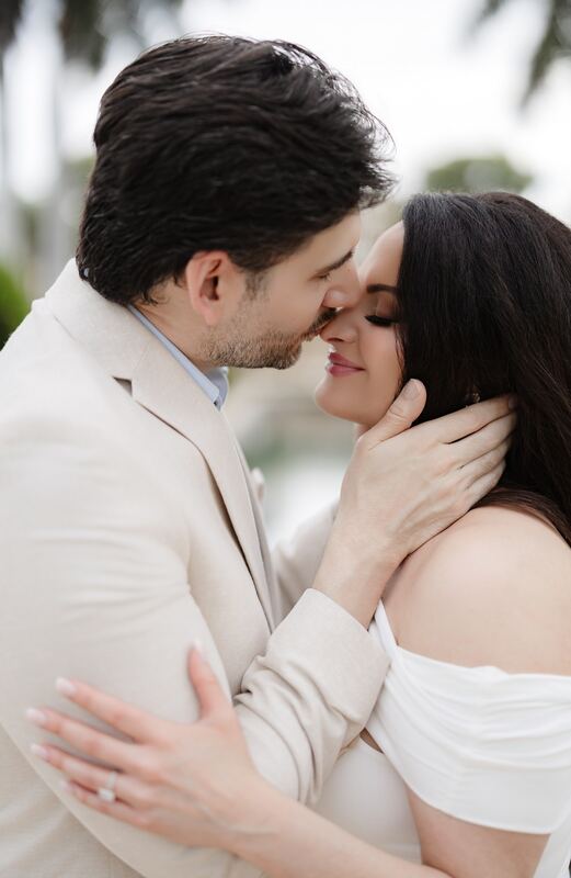 A close embrace, foreheads nearly touching