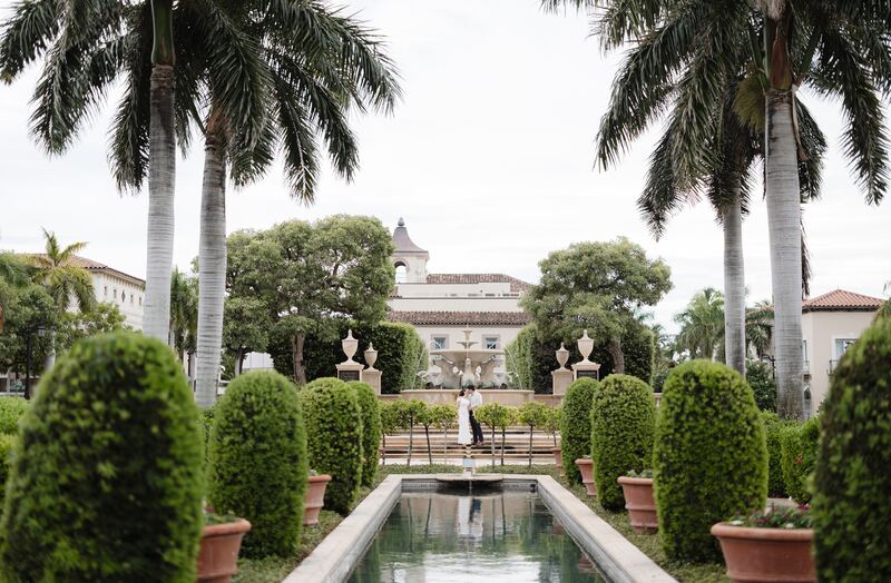 The reflecting pool and royal palms, with Iviani and Joey in the distance